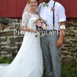 naftzinger photography provided photo of a married couple at a wedding in reinhart barn