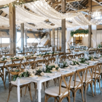 reception barn full of tables and decor